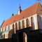 Kazimierz Ko%C5%9Bci%C3%B3%C5%82 Bo%C5%BCego Cia%C5%82a w Krakowie za murem od ulicy Wawrzy%C5%84ca Kazimierz district Krakow in Krakow, Poland