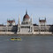 Országház Parlament with bus on Danube Hungarian Parliament Building